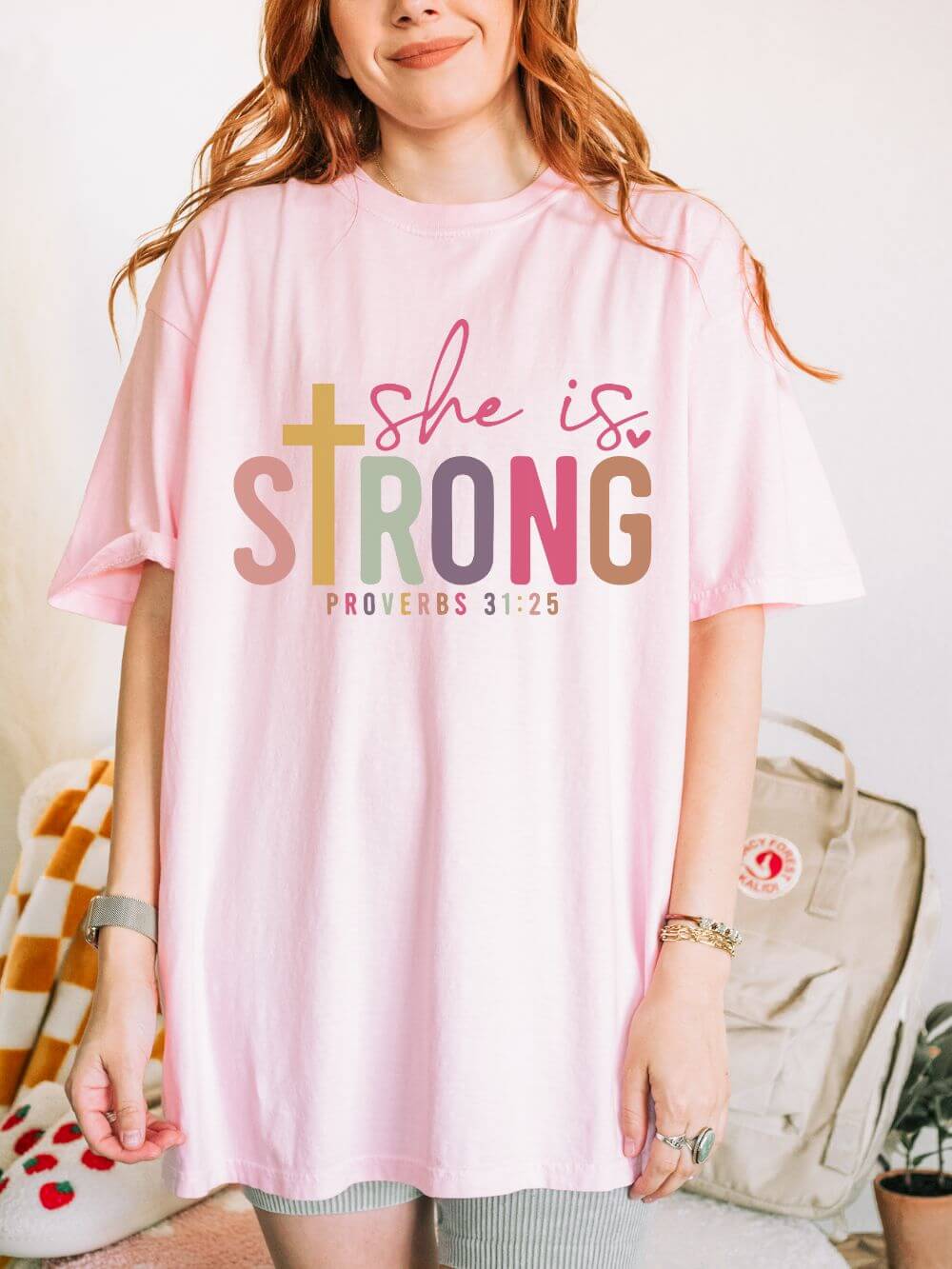 She is Strong Proverbs 31:25 Christian Faith Graphic T-Shirt Unisex Short Sleeve Tee