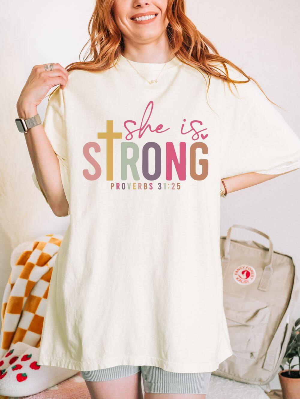 She is Strong Proverbs 31:25 Christian Faith Graphic T-Shirt Unisex Short Sleeve Tee