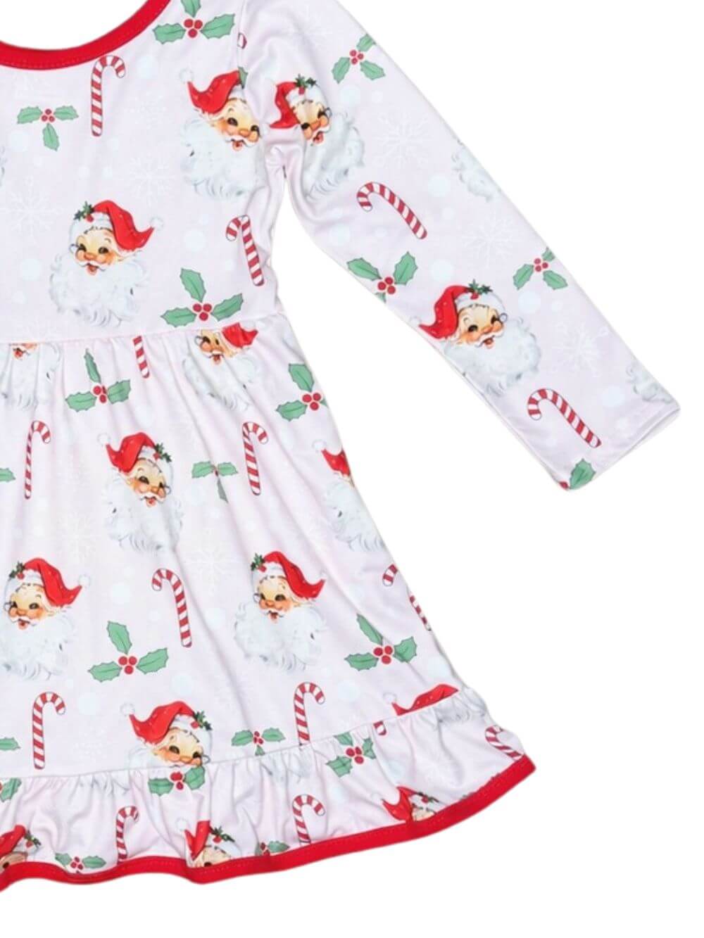 Girls vintage Santa and candy cane Christmas dress with red trim showing hem and bottom details