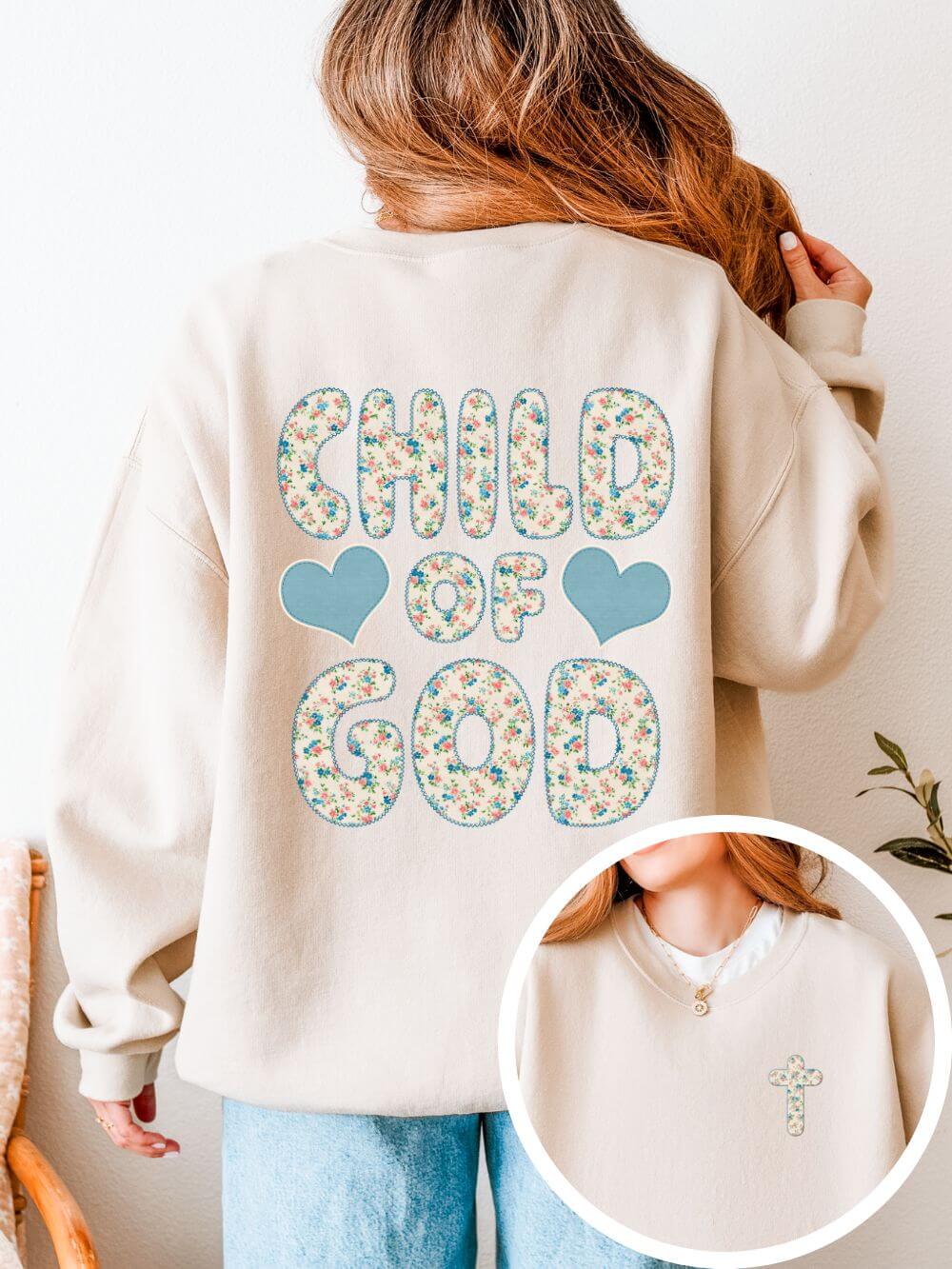 Child of God Christian sweatshirt for women with floral cross graphic