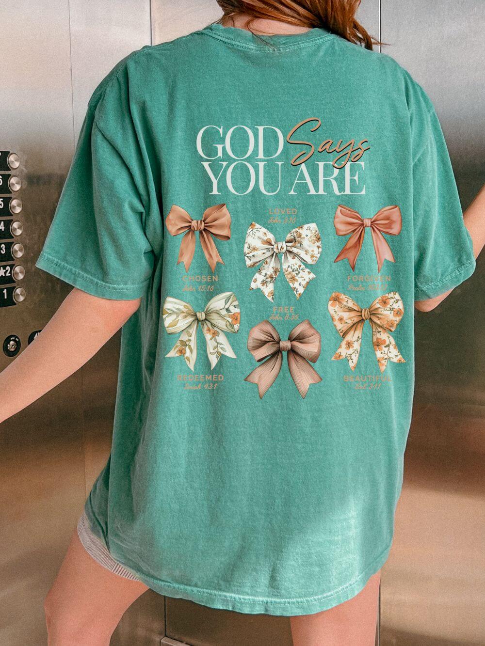 God Says You Are Coquette Bow Graphic T‑Shirt Inspirational Floral Tee