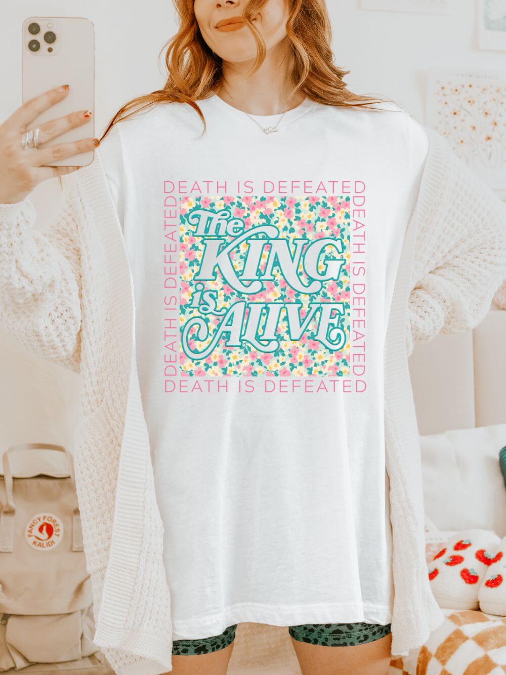 The King Is Alive Floral T‑Shirt Death Is Defeated Christian Easter Graphic Tee