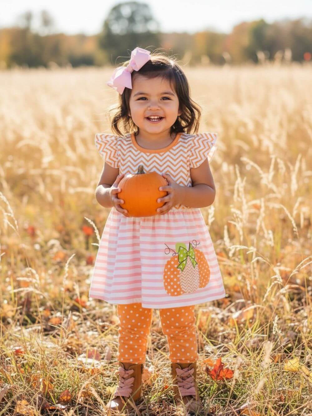 Girl modeling the Little Pumpkin Cutie girls leggings outfit