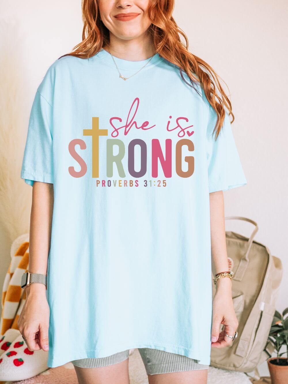 She is Strong Proverbs 31:25 Christian Faith Graphic T-Shirt Unisex Short Sleeve Tee