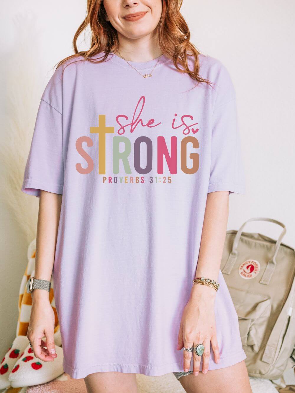 She is Strong Proverbs 31:25 Christian Faith Graphic T-Shirt Unisex Short Sleeve Tee