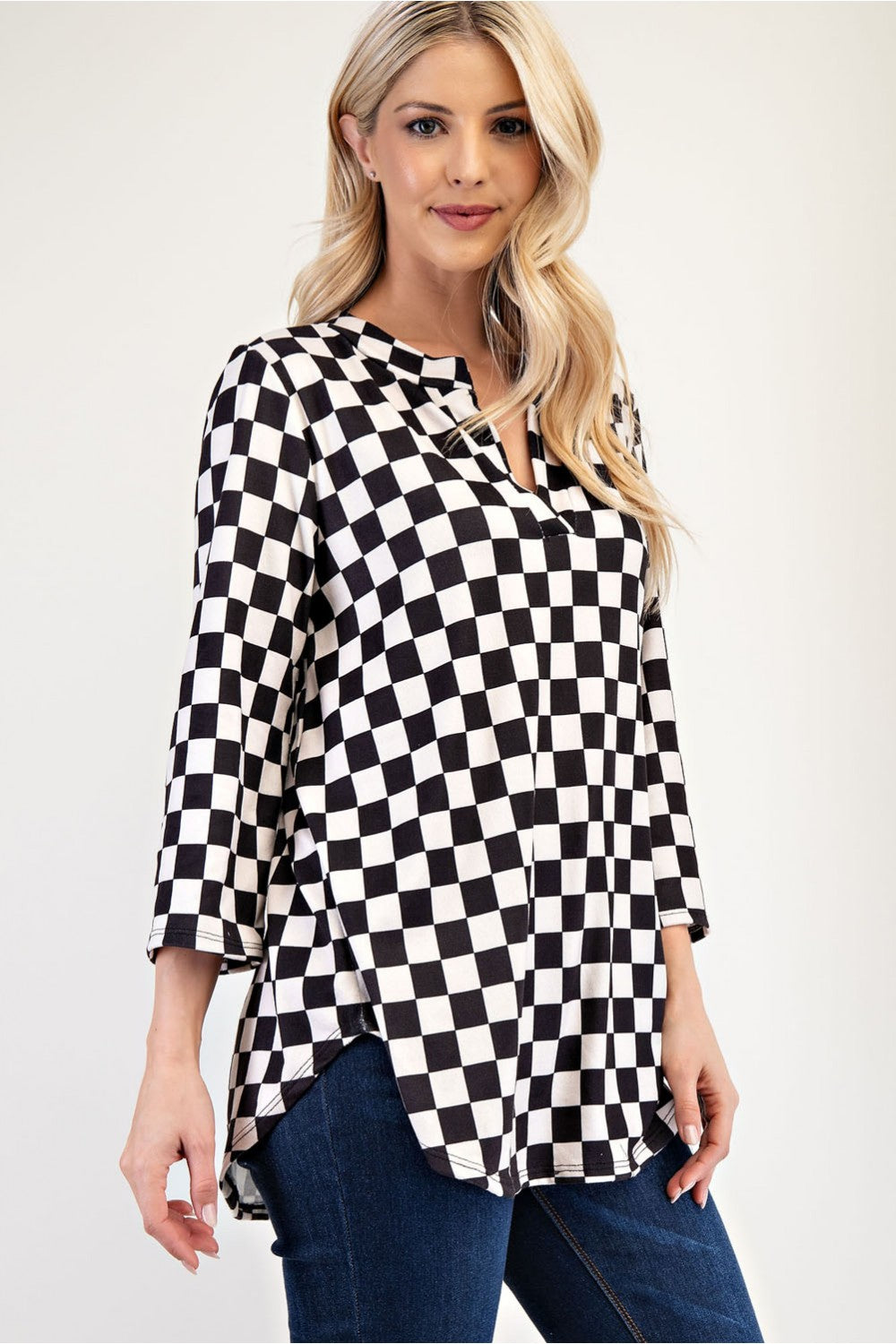 Celeste Full Size Curved Hem Checkered Notched Blouse - Sydney So Sweet