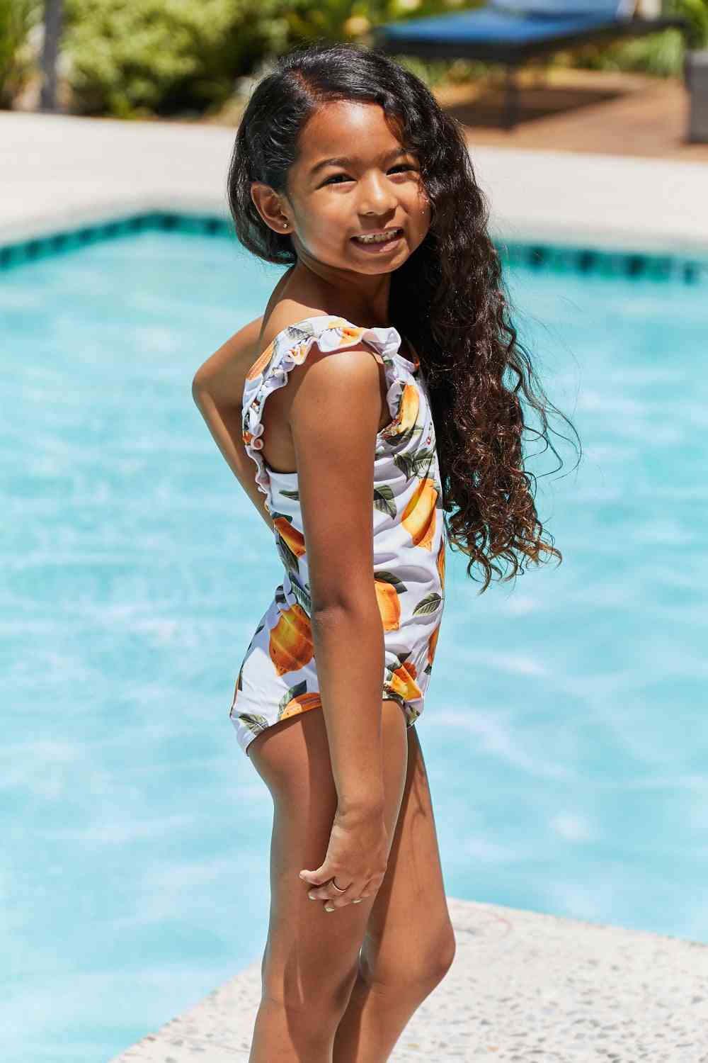 Float On Ruffled Girls One Piece Swimsuit in Citrus Orange